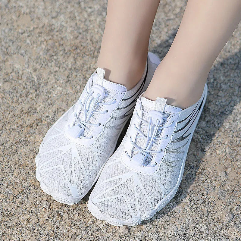 Breathable men's and women's low-top running shoes in a colour option with a lace-up front and rubber sole.