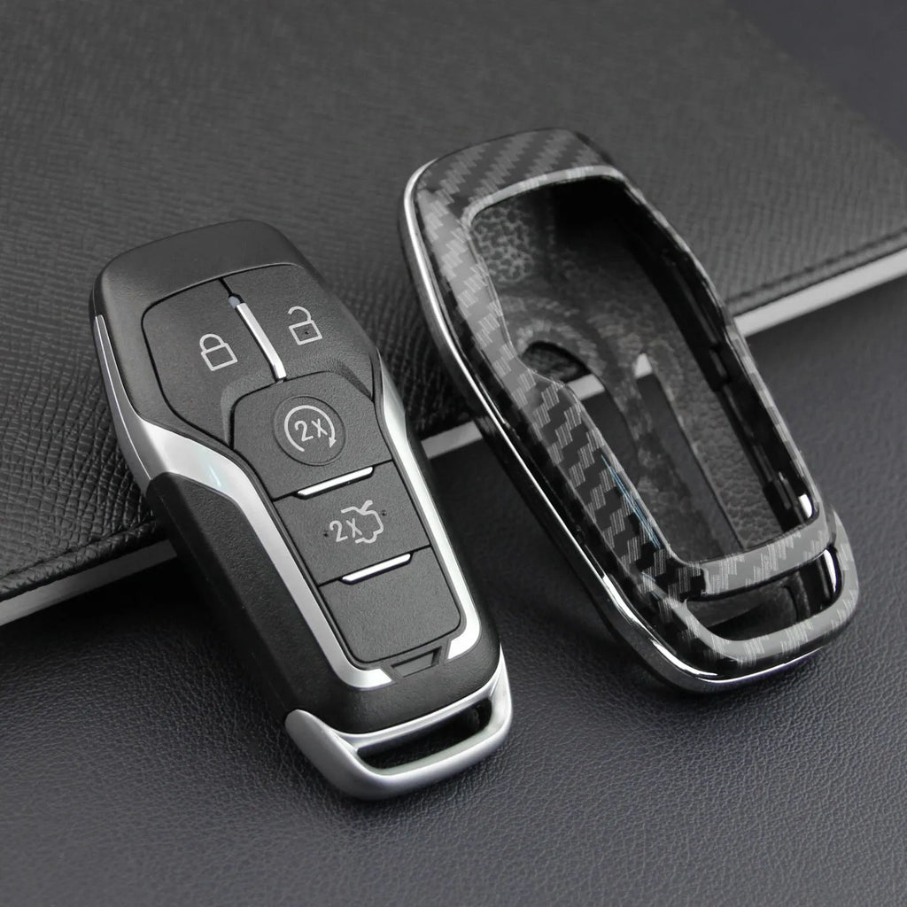 Plastic protective shell for a car key remote control, shown in single shell and buckle-attachment style.