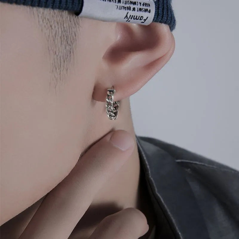 Men's silver geometric hoop earrings in 10mm and 14mm sizes on a plain background.