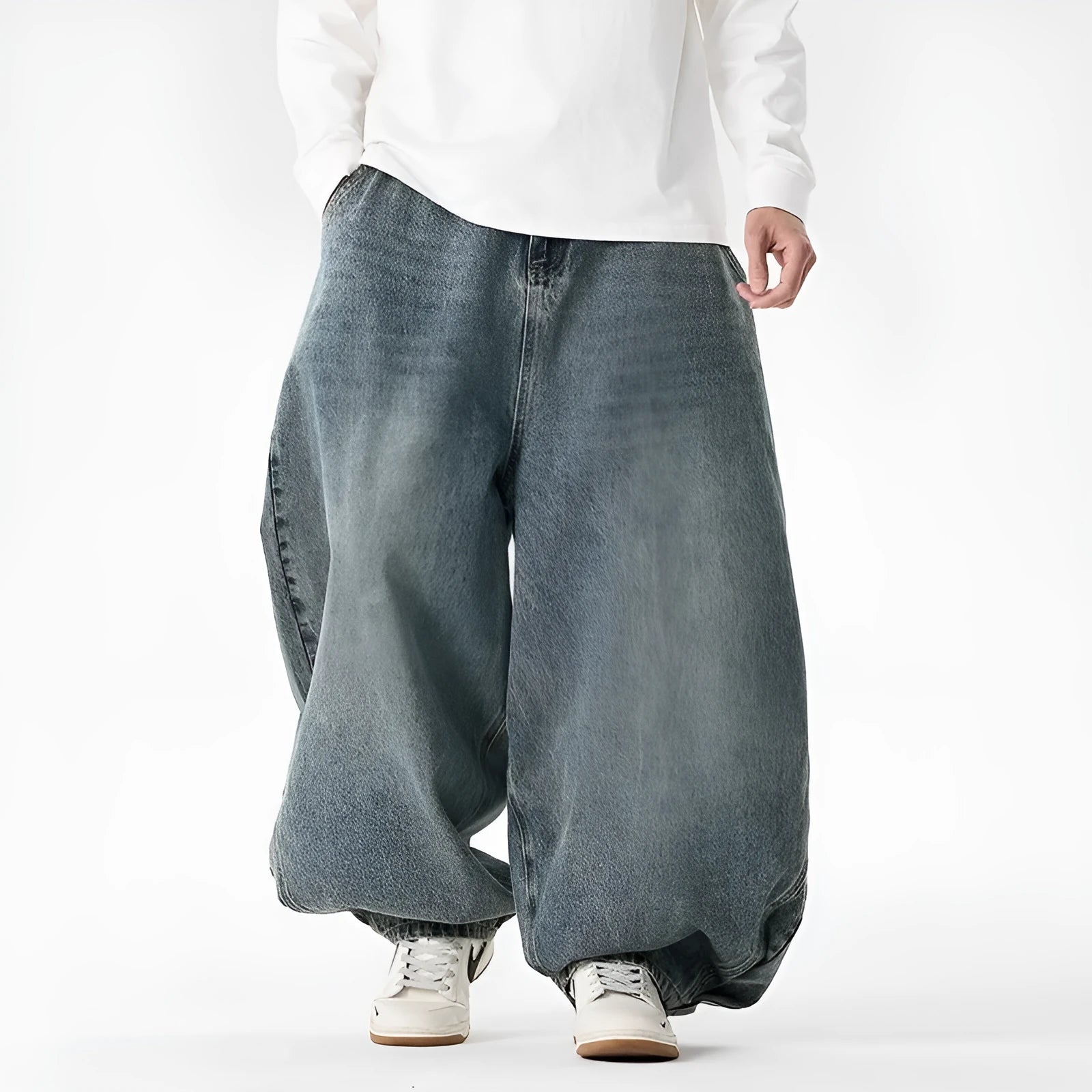 Men's plus size wide leg jeans in dark blue denim with a baggy fit and straight leg opening.
