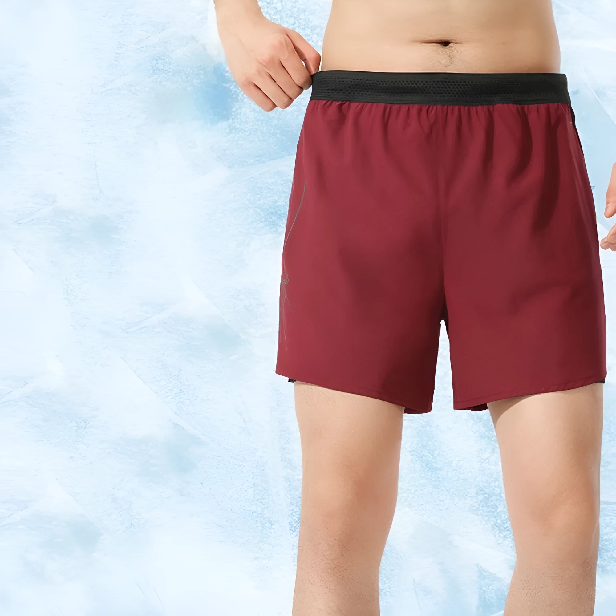 Men's solid colour polyester basketball shorts on a hanger, showing low-waist design.