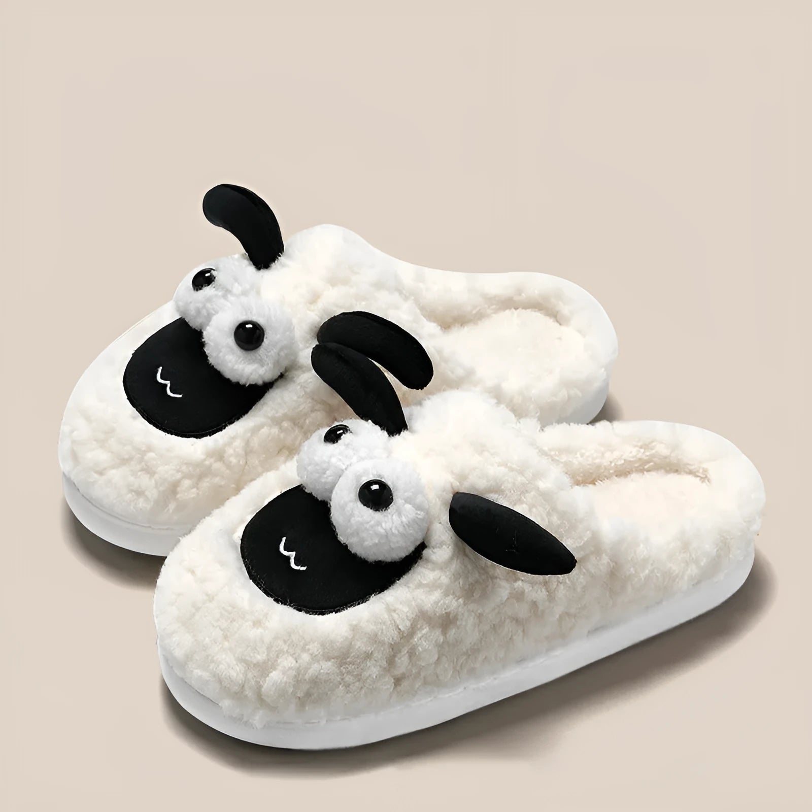 Slip-on slippers with suede upper and PVC sole in white, grey, and brown colour options