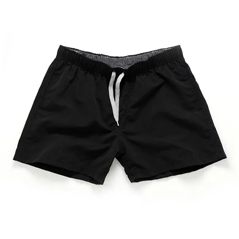 Men's polyester beach shorts in multiple colours with straight leg opening, suitable for surfing and swimming