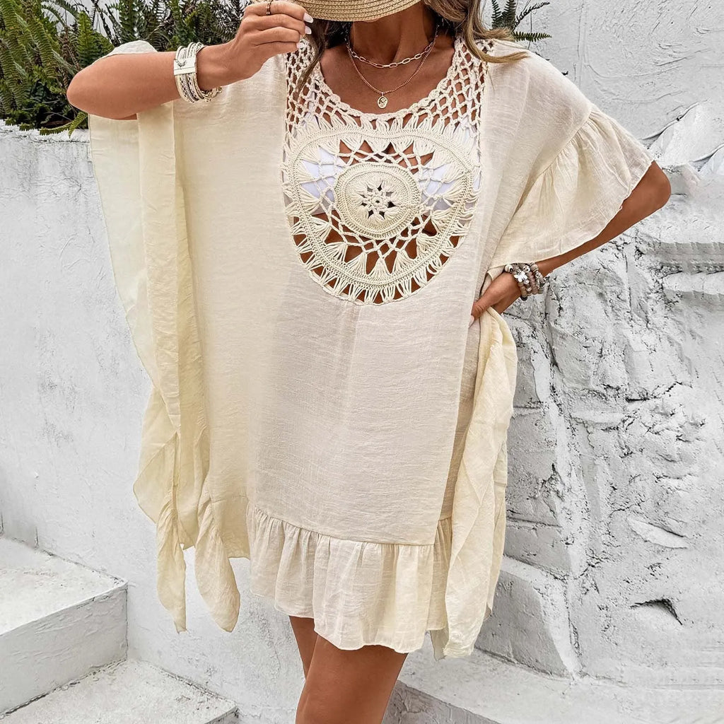 Beach dress swimsuit with crochet stitch patchwork skirt and tassel detail in apricot colour.