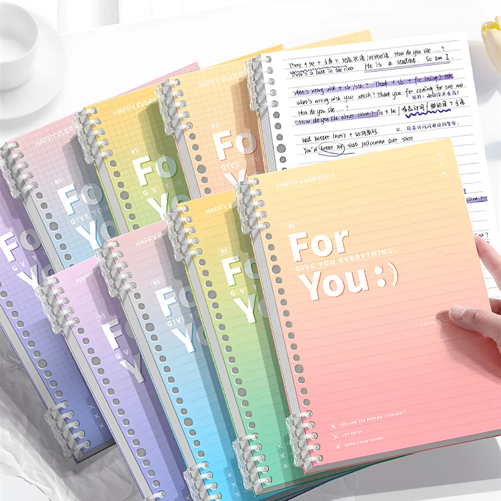 Removable coil gradient notepad with PP cover in blue, green, pink, and purple colour options.
