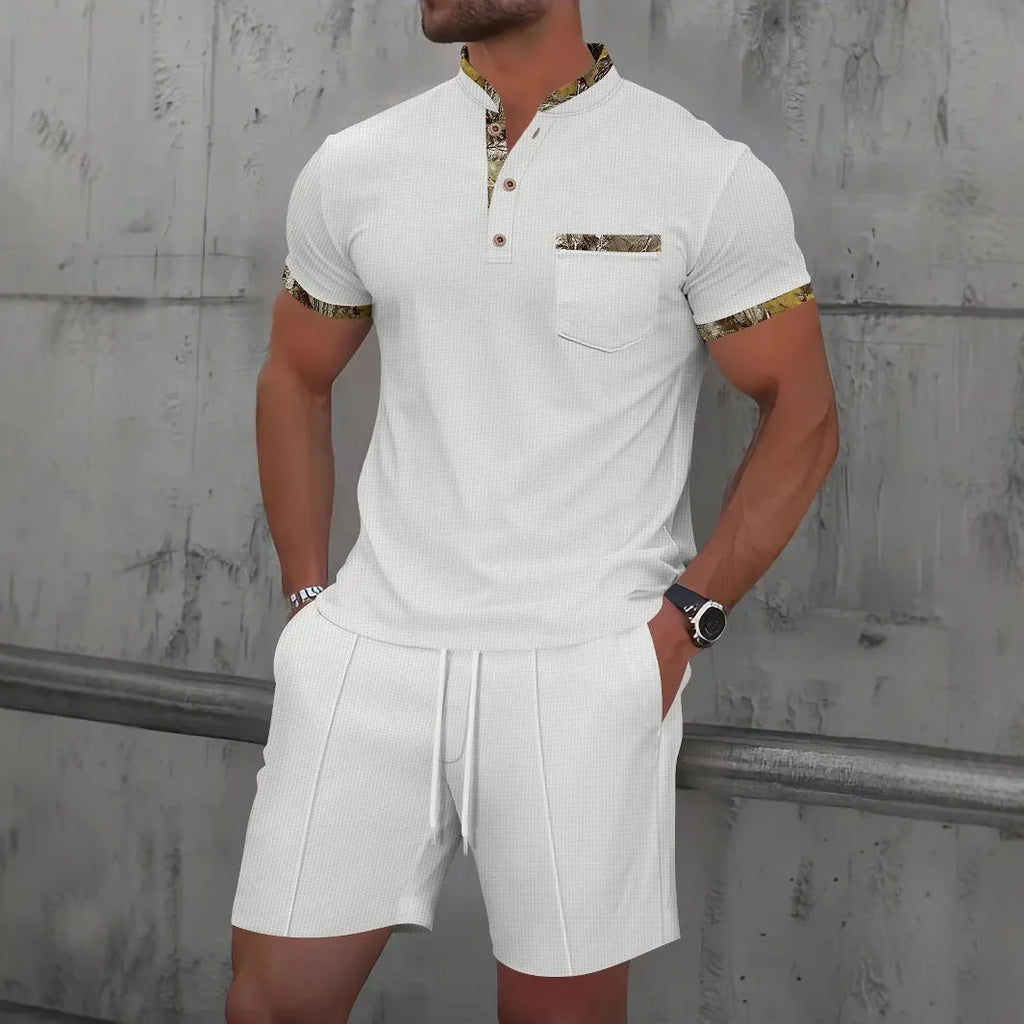 Men's grey waffle zipper polo collar short sleeve top with matching shorts laid flat