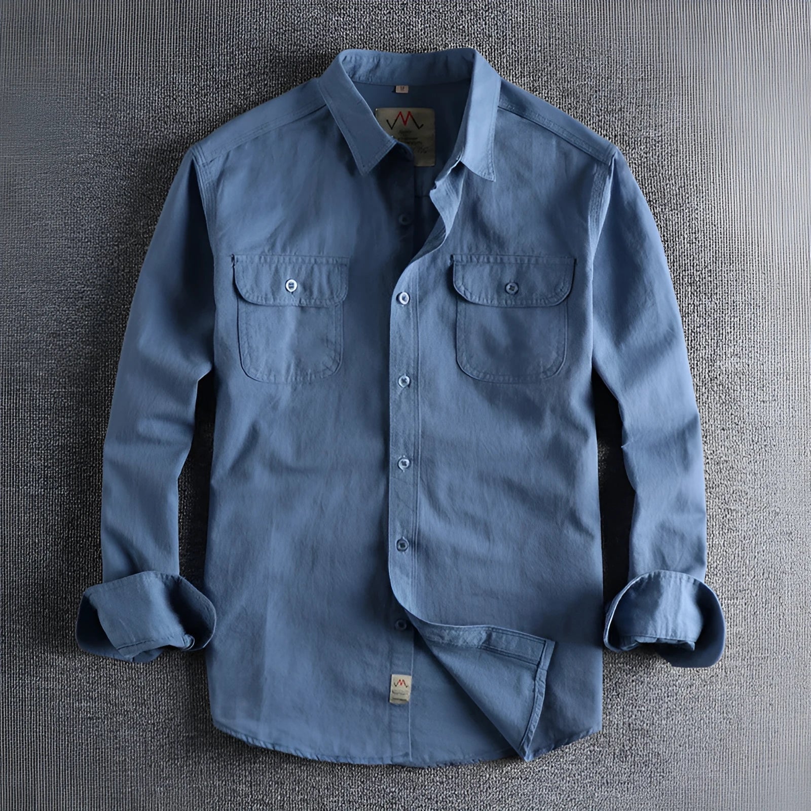 Men's solid colour cotton long sleeve shirt in cardigan style, shown in light blue.