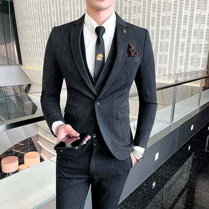Men's slim fit British style business suit in black or dark grey cotton blend fabric