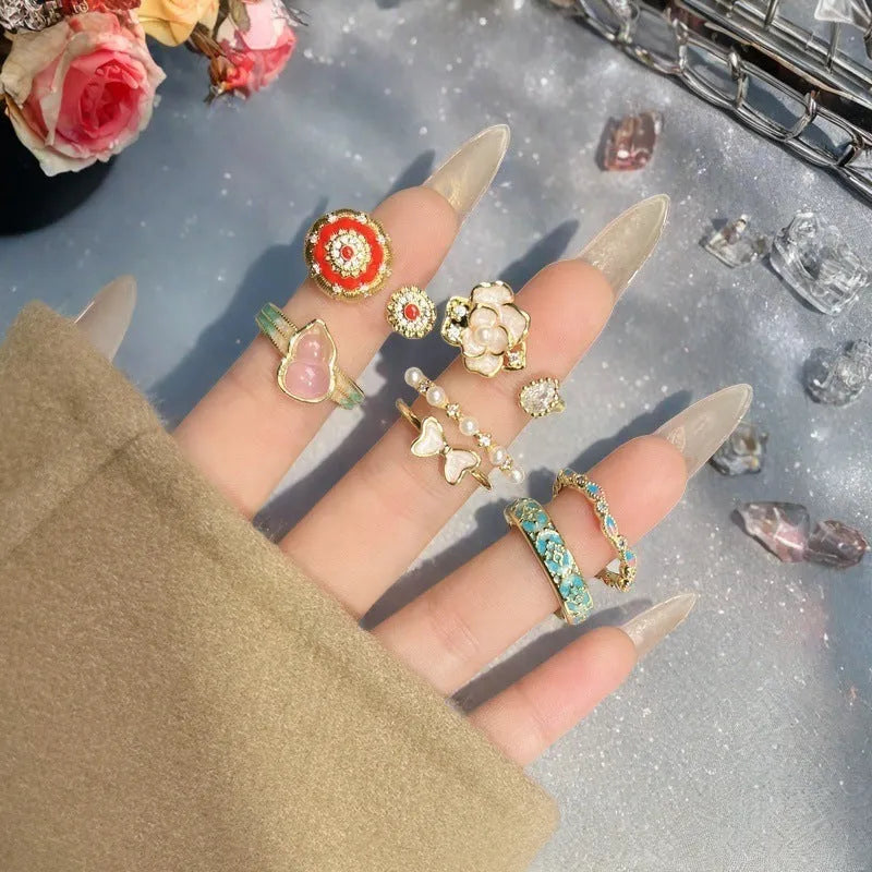 Adjustable copper gourd ring with inlaid zircon stones in a vintage oil dripping finish.