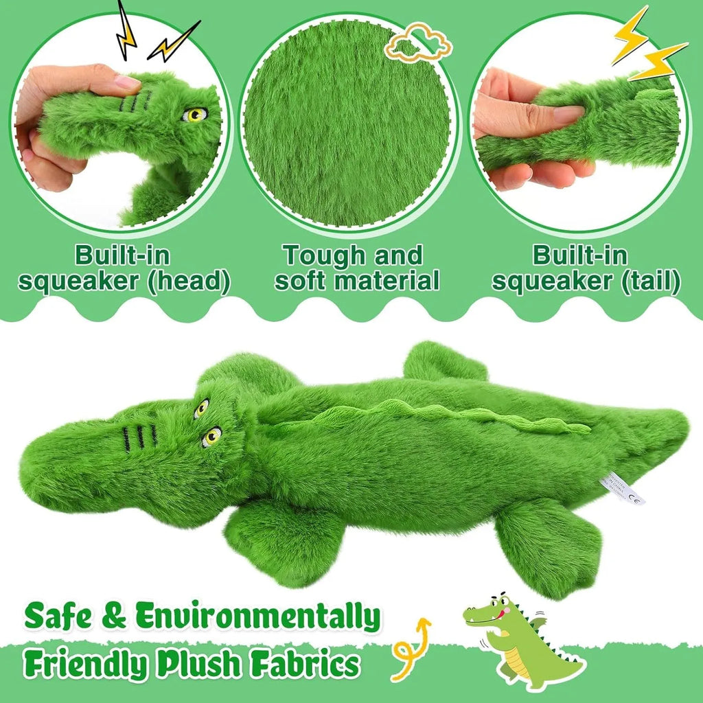 Green crocodile-shaped plush dog toy with no stuffing, squeaker in head, and crinkle paper tail
