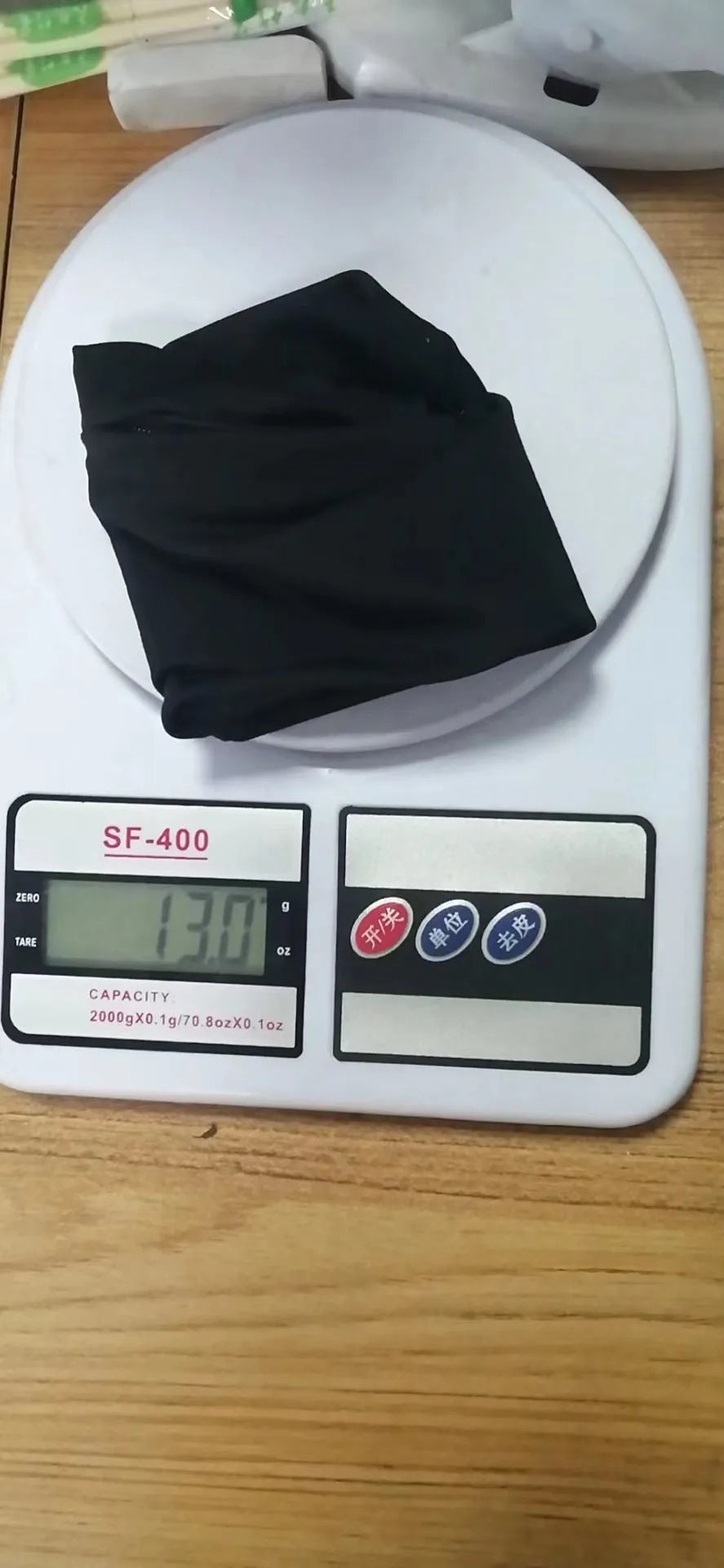 Compact 10x10.5cm wrist bag armband sleeve for mobile phones, shown with cardboard packaging for camping and fitness use.