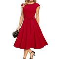 Sleeveless black dress with lace-up mid waist and a flowing swing skirt.