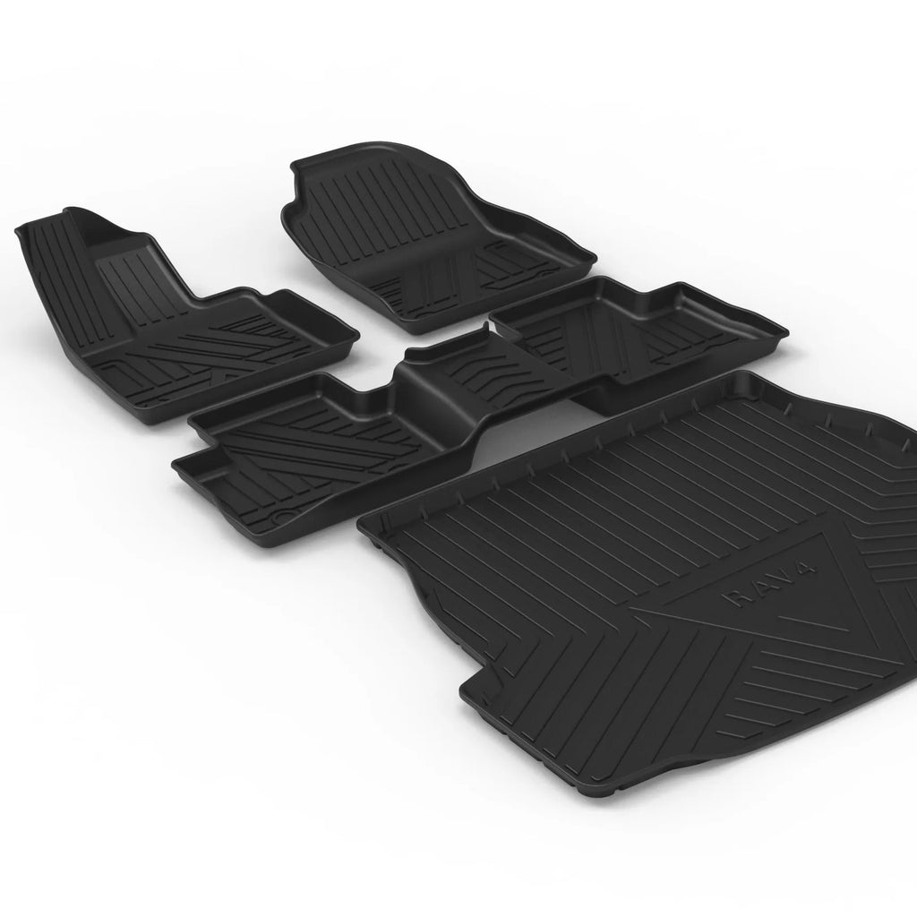 Black carbon fibre pattern TPE trunk pad installed in a car boot showing custom fit and textured surface