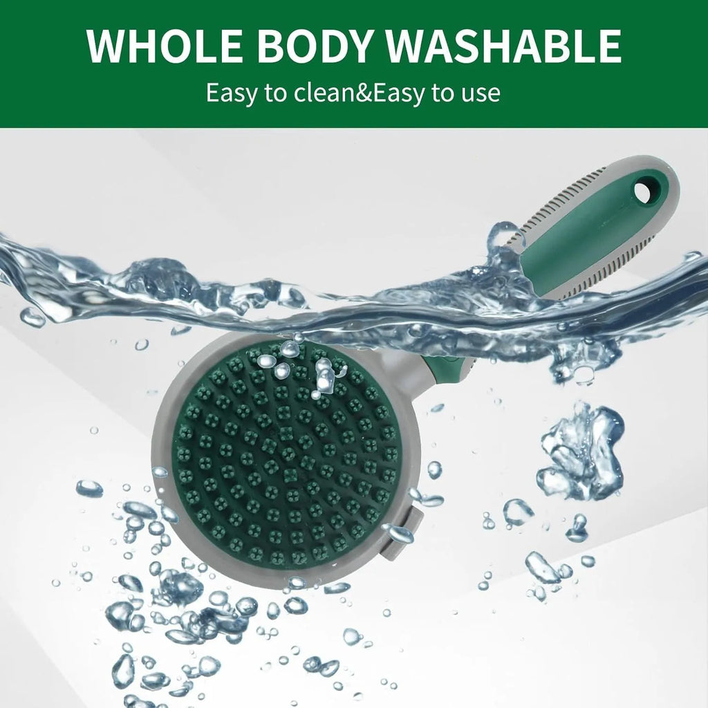 Green and pink two-sided pet grooming brush with a slicker head and a silicone massager head on a textured handle.