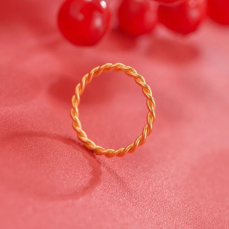 Women's brass gold plated ring showing twist, matte, and glossy simple bracelet styles