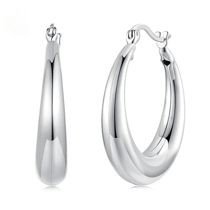 Copper alloy geometric ring ear clip earrings with silver needle closure in three size options