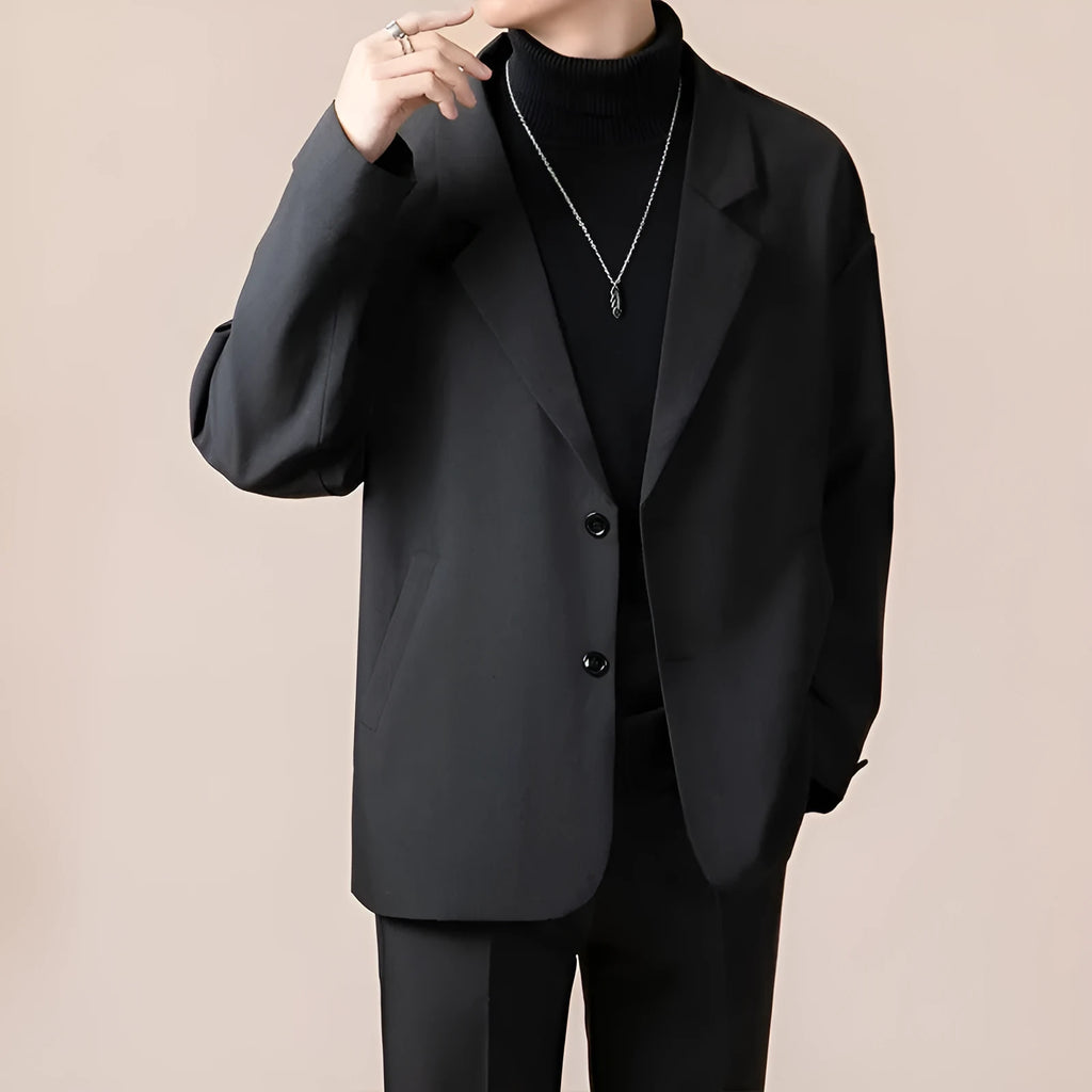 Man wearing a loose-fit apricot coloured casual suit jacket for smart-casual occasion.