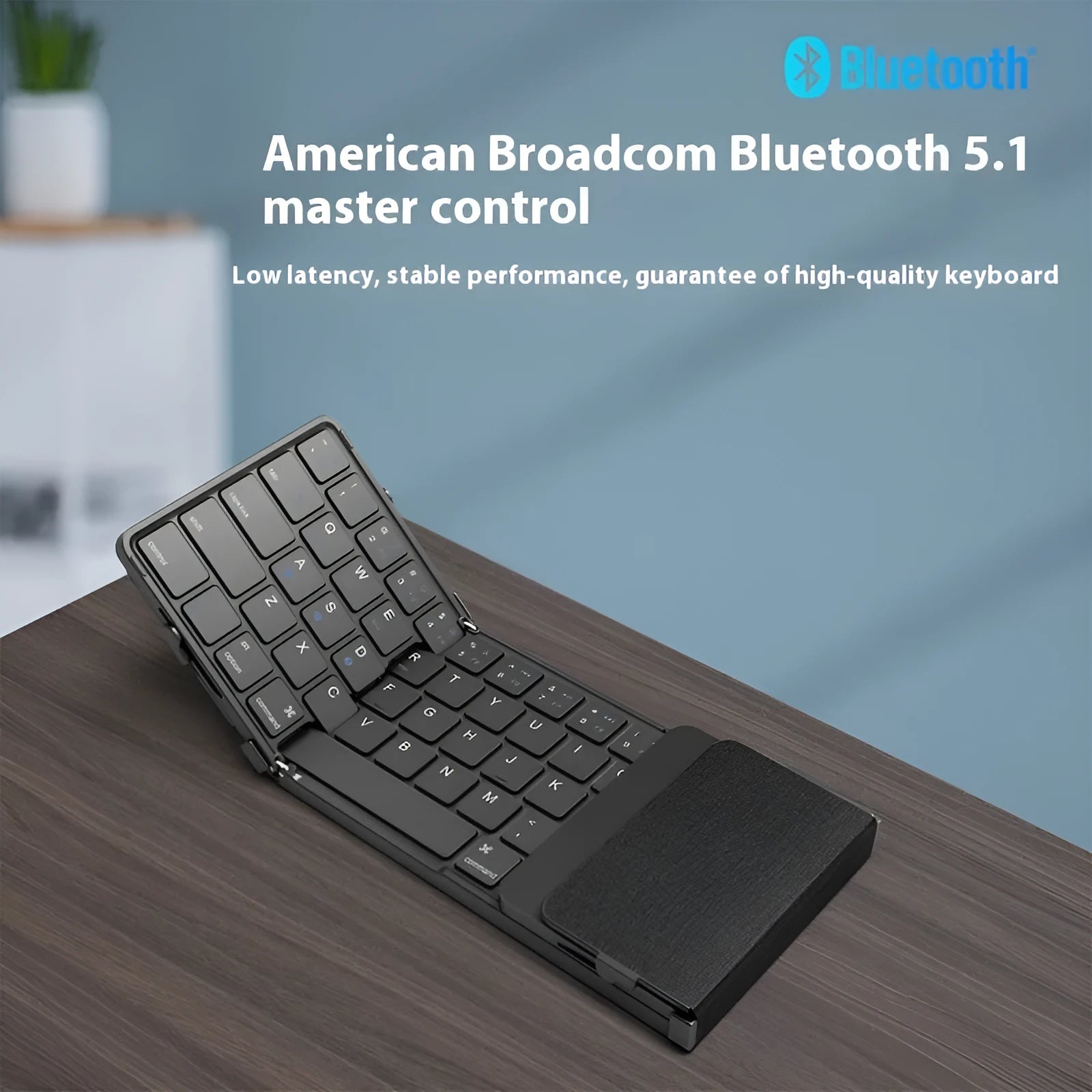 Black folding Bluetooth keyboard with either touchpad or digital board accessory for mobile phones and tablets