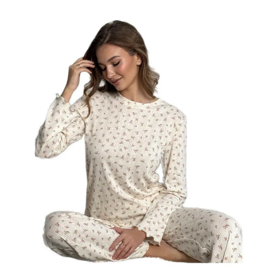 Women's white floral print pyjama suit with bell sleeve top and wide leg trousers