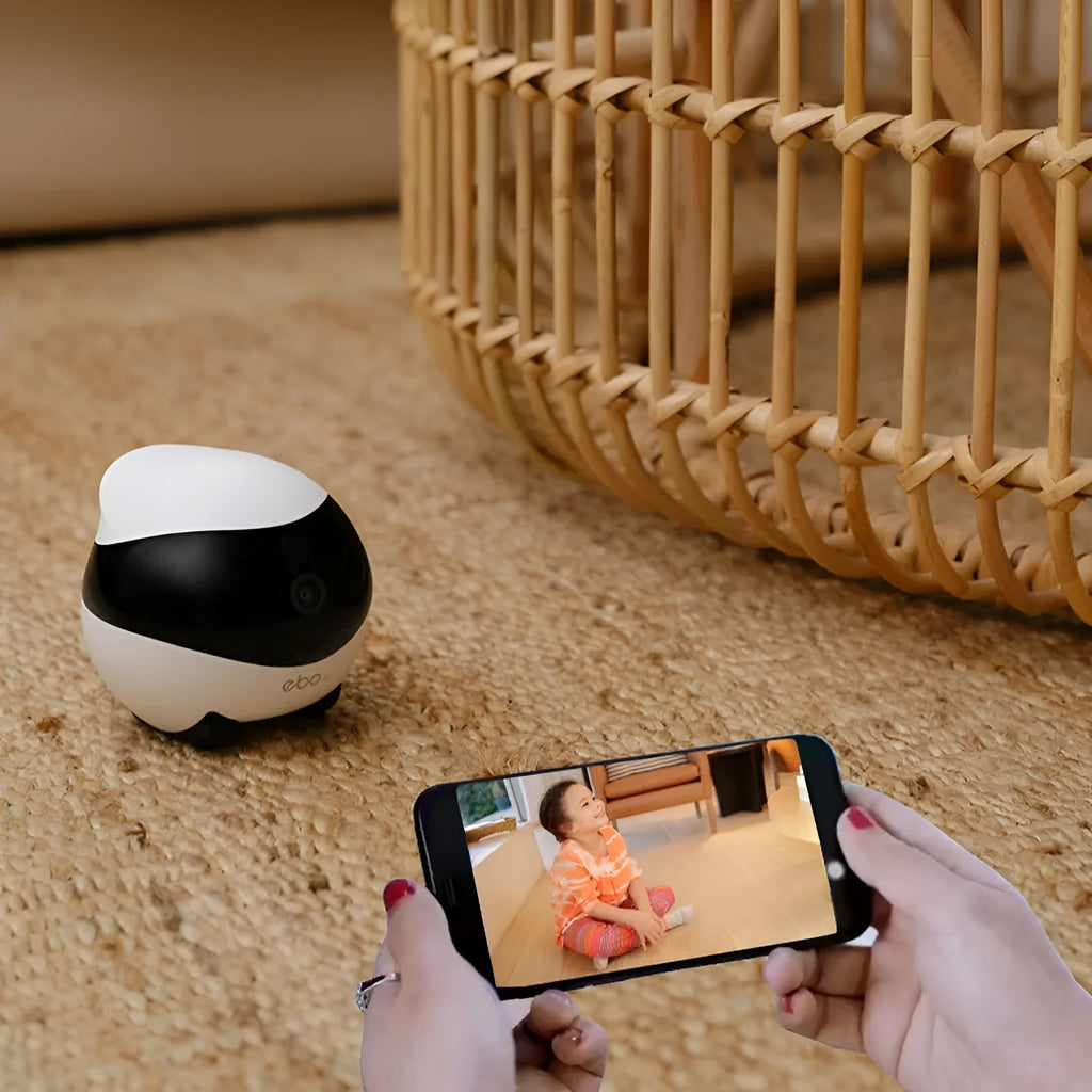 Smart home mobile surveillance robot camera on floor with charging dock