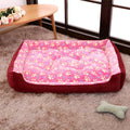 Beige plush dog bed with high bolsters and a removable washable cover for small pets.