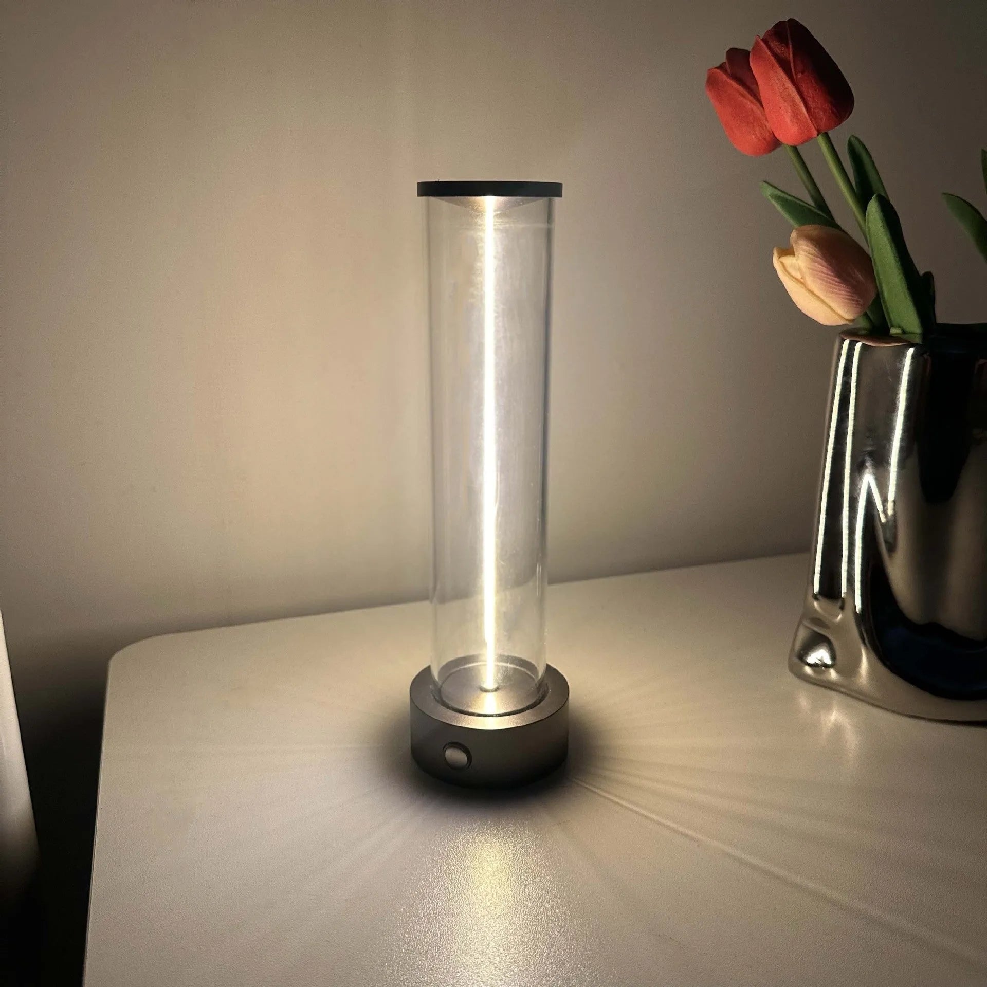 Slender LED glass light strip with magnetic mounting and USB charging cable