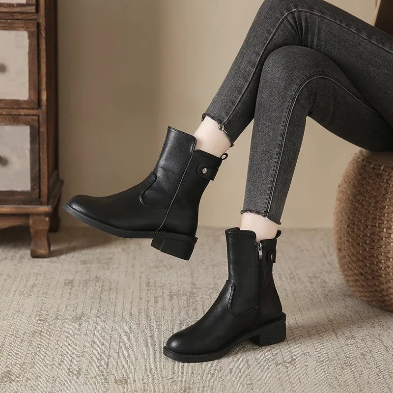 Black women's short boots with side zipper and low heel