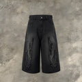 Men's black denim shorts with flame embroidery patch and cropped length for summer streetwear