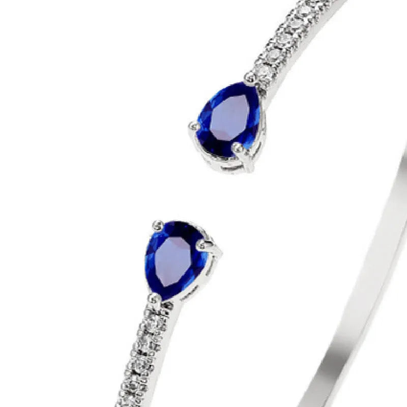 Multi-zircon copper bracelet with inlaid stones in blue or white colour options