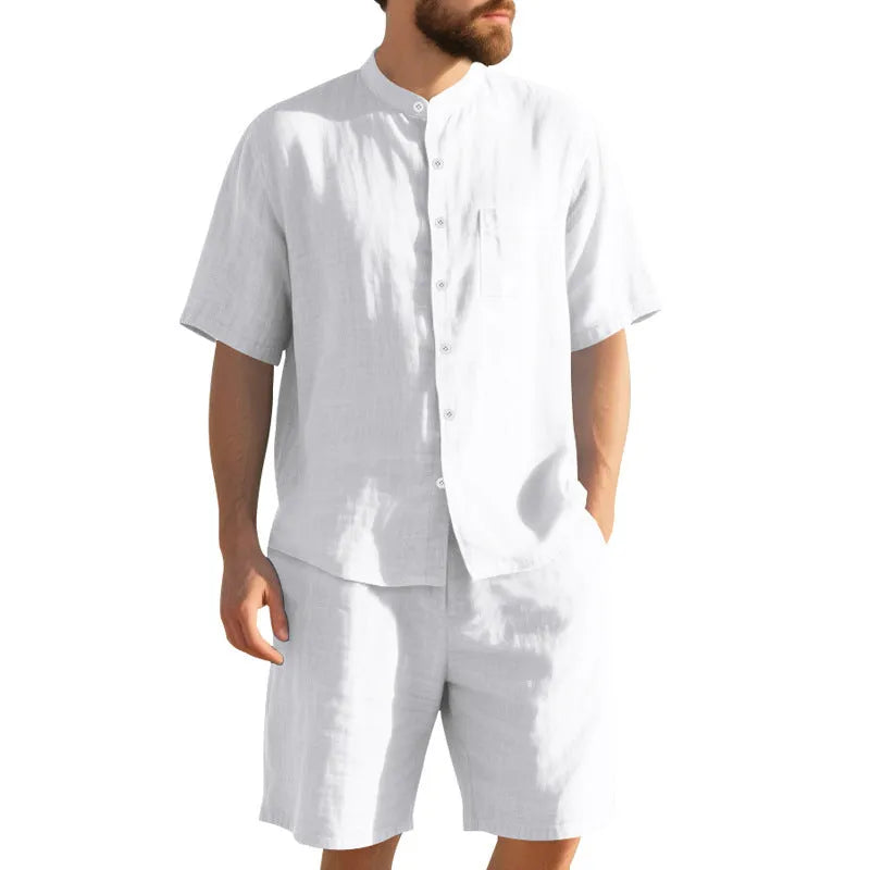 Men's linen two-piece summer suit with Henry collar jacket and matching shorts in light blue colour