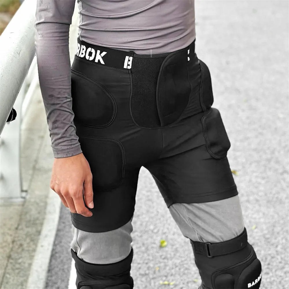 Black Spandex and NBR foam hip protection pad for sports like roller skating and skateboarding.