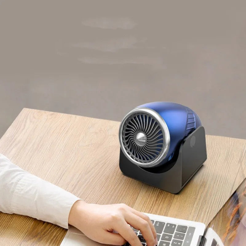 Navy blue 12V car heating fan with adjustable nozzle for defrosting windows and warming car interiors.