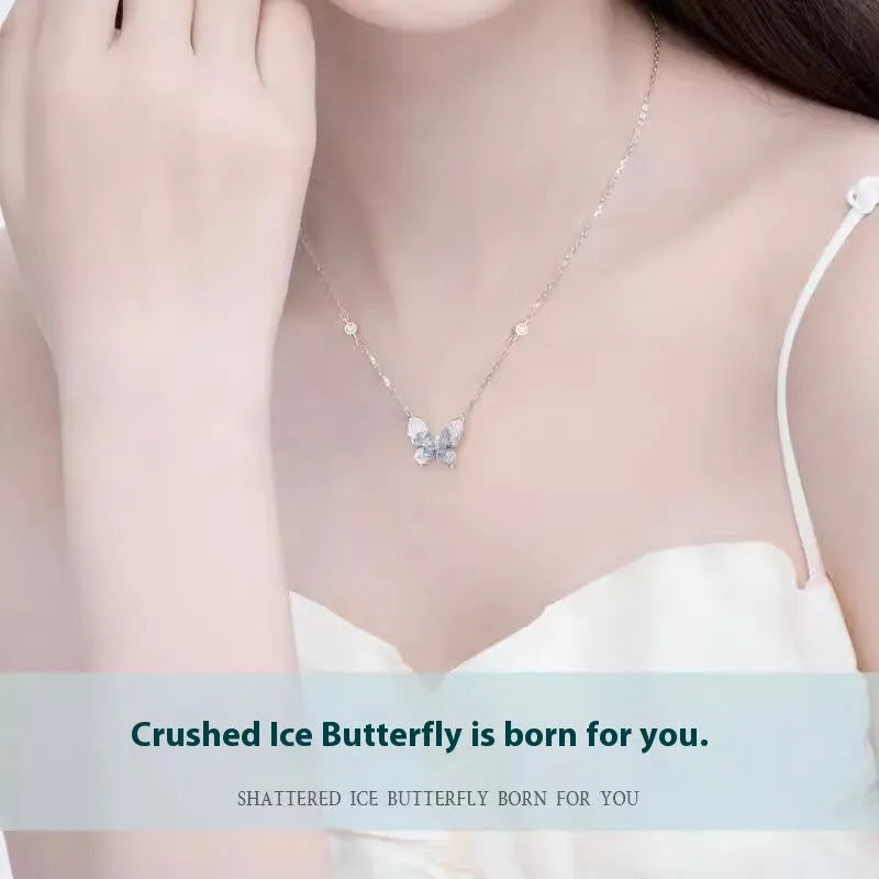 Close-up of a silver butterfly pendant necklace on an adjustable O-ring chain.