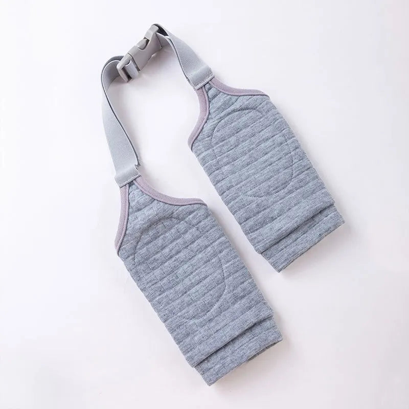Blue dog knee protector sleeve with elbow padding and plastic buckle, shown with a matching patterned scarf.