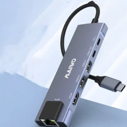 Aluminium Steam Deck six-in-one docking station with Type-C cable, HDMI, Ethernet, and USB ports.