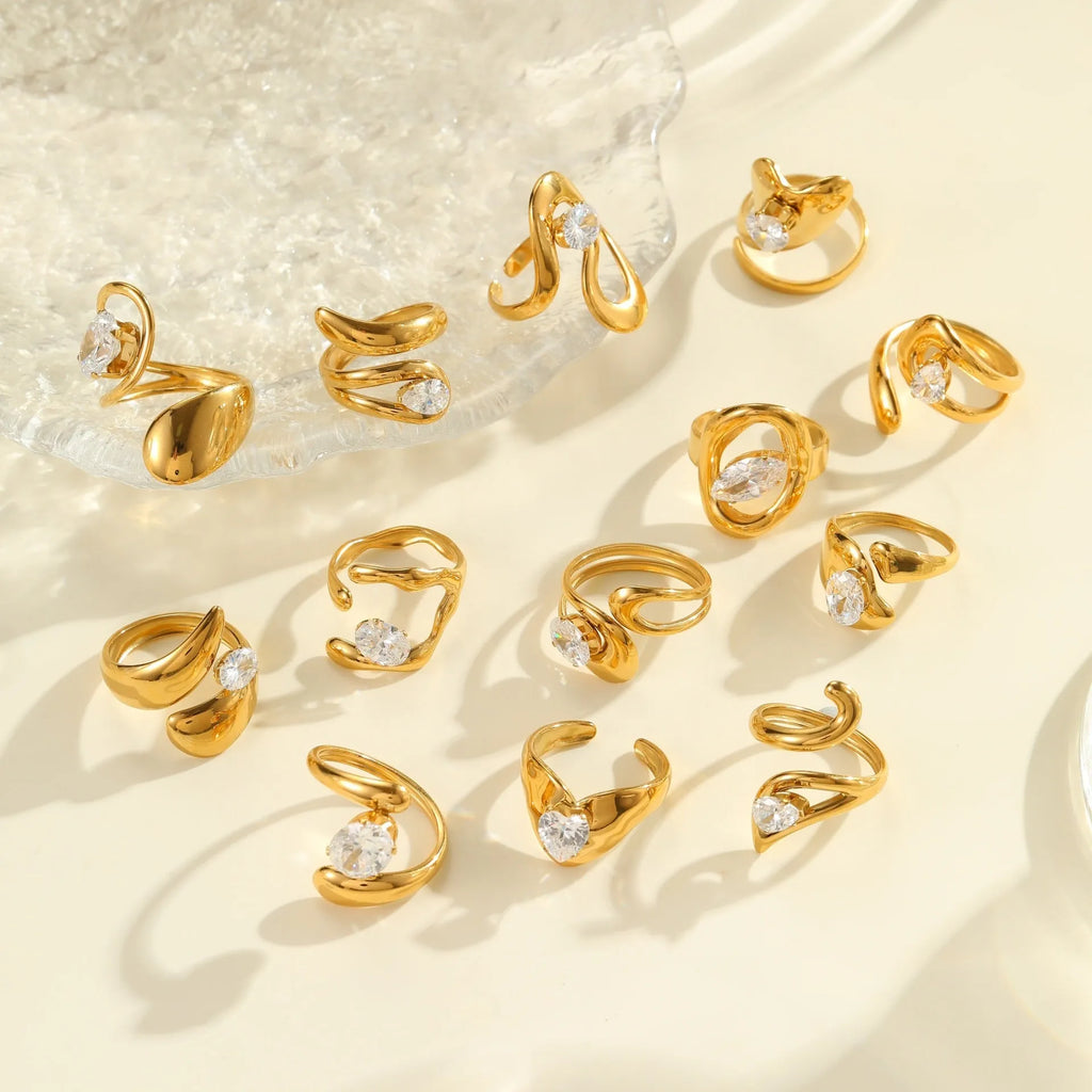 Geometric zircon ring with stainless steel construction and open mouth design in electroplated finish