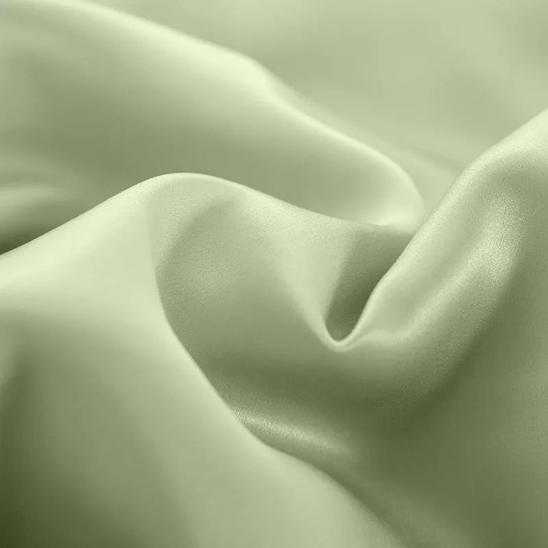 Silk duvet cover in Lotus Pink colour showing double-sided bedding with plain weave texture