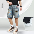 Blue ripped men's denim shorts with graffiti print and straight-leg cut.