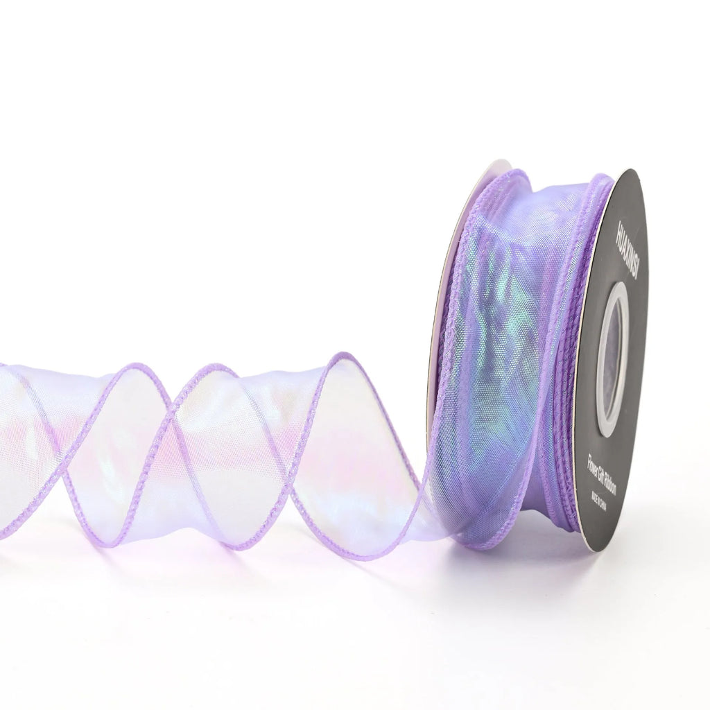 Fishtail yarn floral ribbon roll in mesh material with wave edge pattern measuring 4cm wide