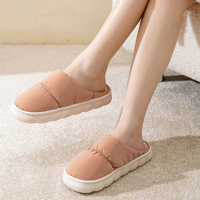 Blue couple's winter slippers with artificial leather upper, plush lining, and thick rubber anti-slip sole.