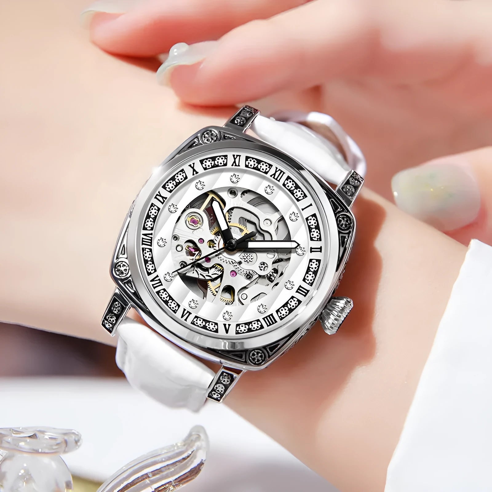 Mechanical wristwatch with luminous dial on leather strap, available in multiple colours including black, red and white