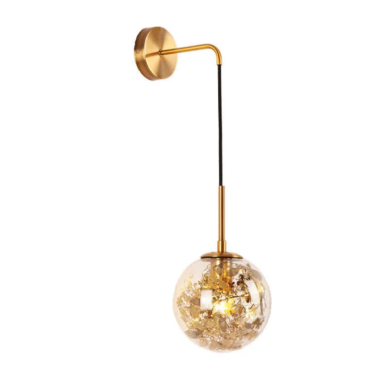 Small modern glass wall lamp in golden flower or silver flower finish for bedside lighting.
