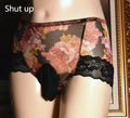Men's black ice silk mesh mid-waist briefs lying flat, showing ultra-thin fabric texture.