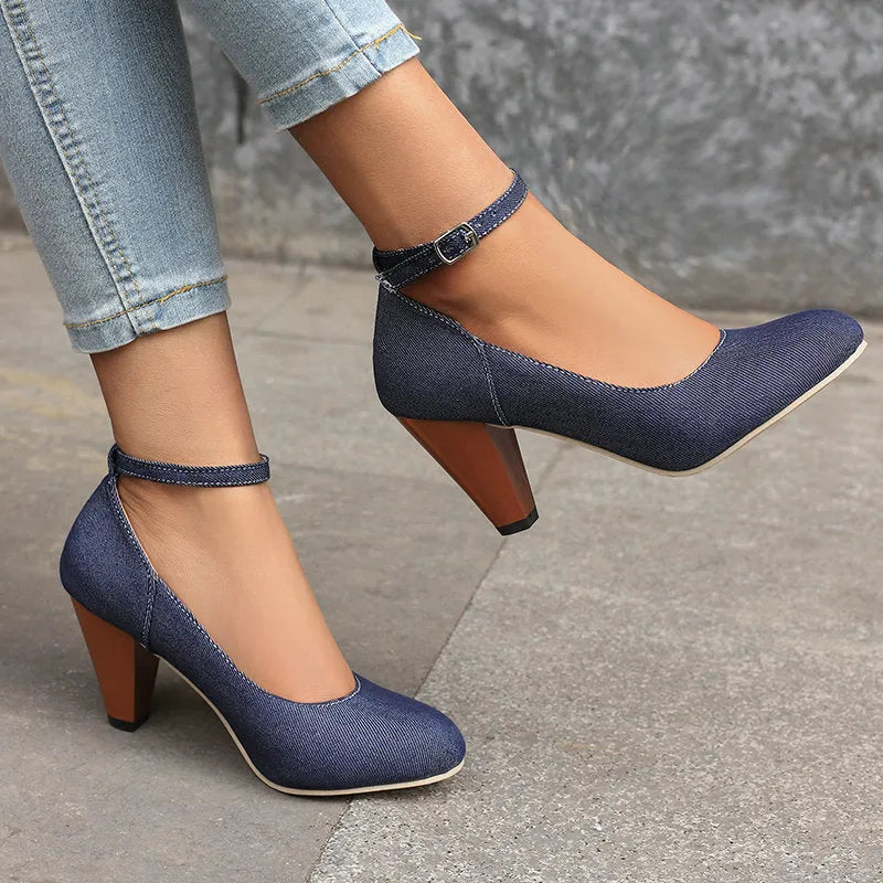 Blue denim women's platform heel shoes with a buckle strap and waterproof sole.