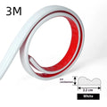 Flexible PVC self-adhesive background wall shaping frame on a white surface, showing black, gold, silver, and white colour options.