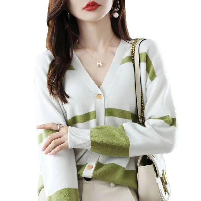 Women's black and white striped V-neck knitted cardigan with a 3D pattern and slim fit.