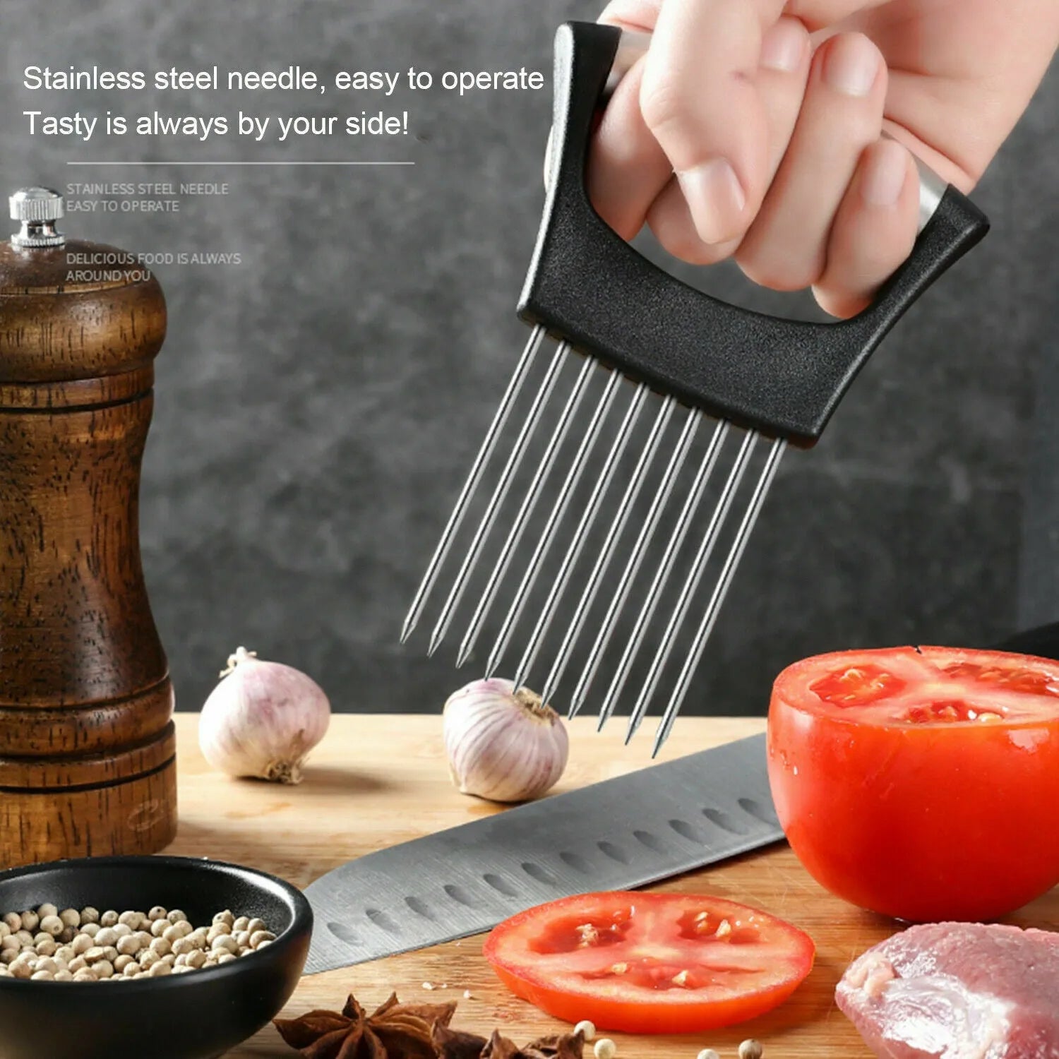 Stainless steel onion slicer tool with needles on a white ABS base.