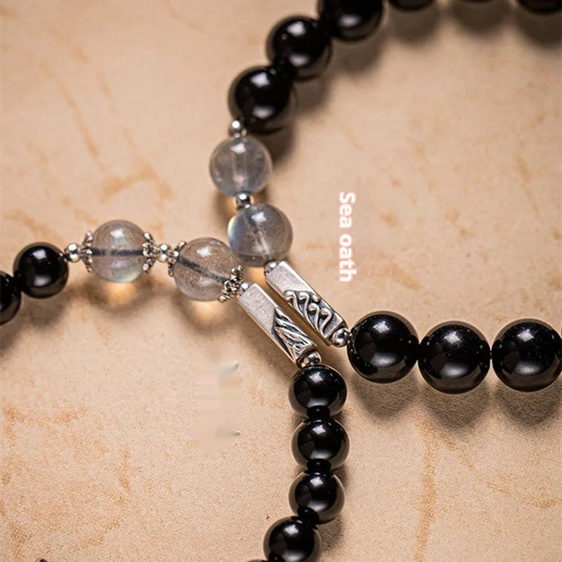 Obsidian Buddha beads couple bracelet DIY set showing 10mm men's and 8mm women's sizes in national style