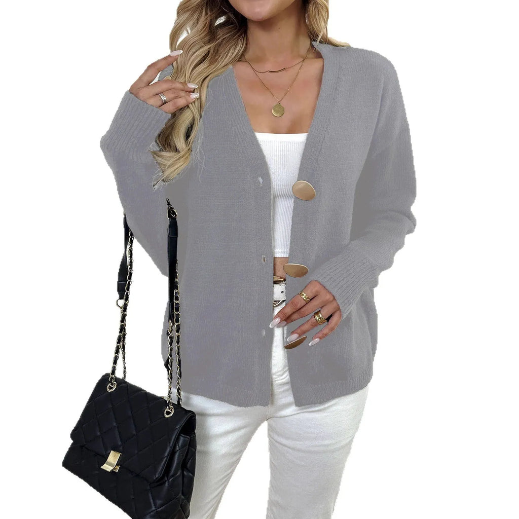 Women's grey deer plush sweater coat with princess sleeves and irregular hemline on hanger