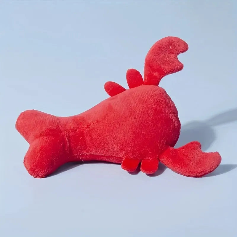 Red lobster shaped squeaky dog toy with crab claw details for small medium dogs